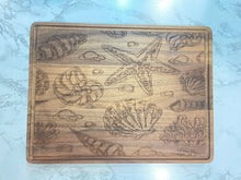 Load image into Gallery viewer, Sea Shell Design Maple or Walnut Cutting Board
